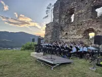 Godba na pihala Ojstrica že tretje leto zapored poskrbela za nepozaben večer pod zvezdami na Starem gradu v Dravogradu