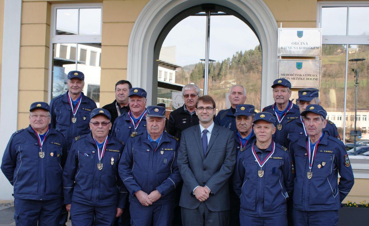Državni prvaki PGD Kotlje na sprejemu pri županu Raven