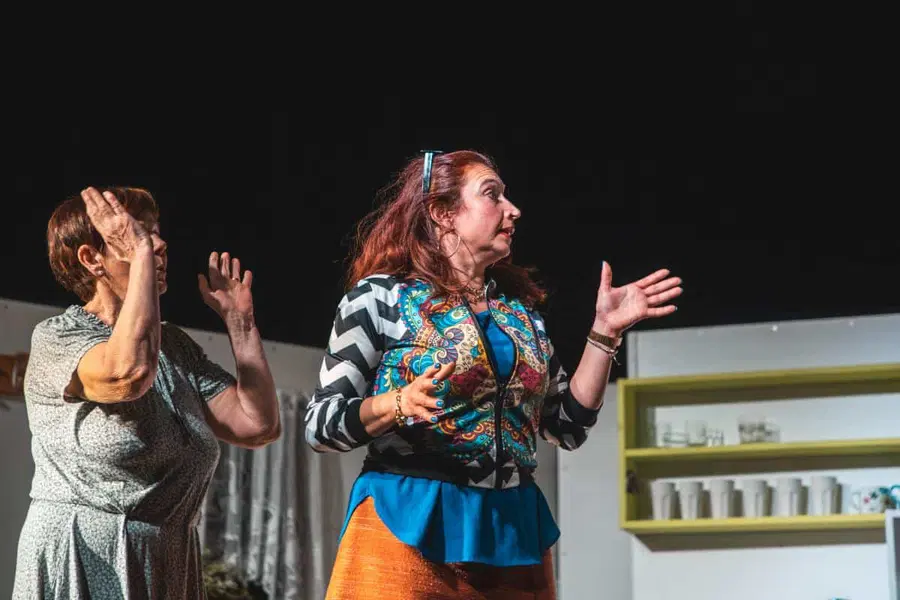 Dan žena na Ravnah na Koroškem praznovali sinoči